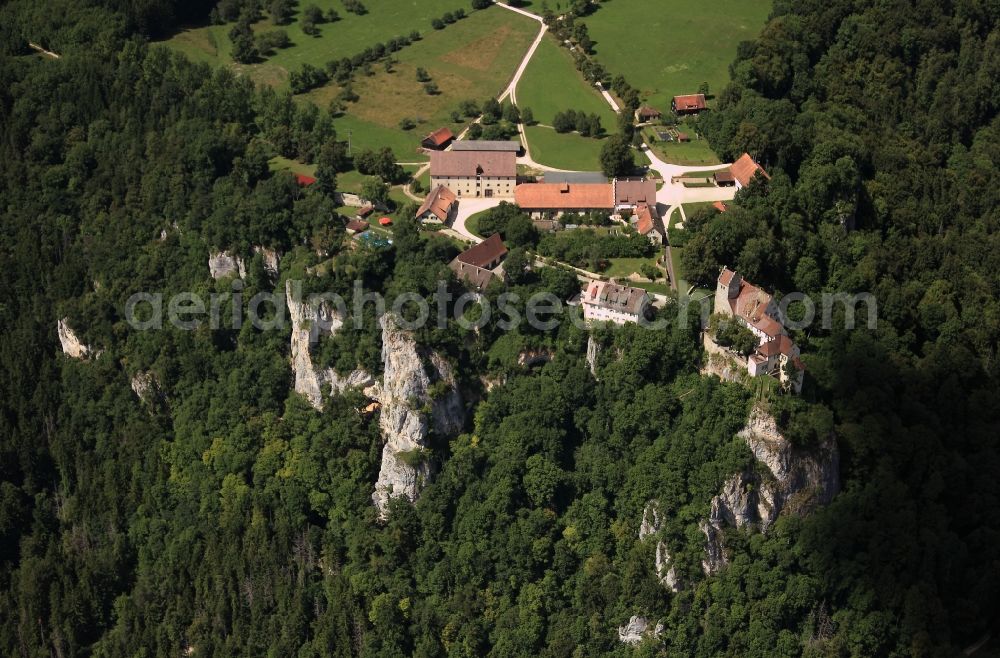 Aerial image Beuron - Castle Werenwag in the borough of Beuron in the Upper Danube Valley in the state of Baden-Württemberg. The castle is located on a rock, surrounded by forest. The castle keep of a historic fortress from the 12th century is part of the compound. Today the castle is Wolfgang Gerberely owned by the family of Fürstenberg