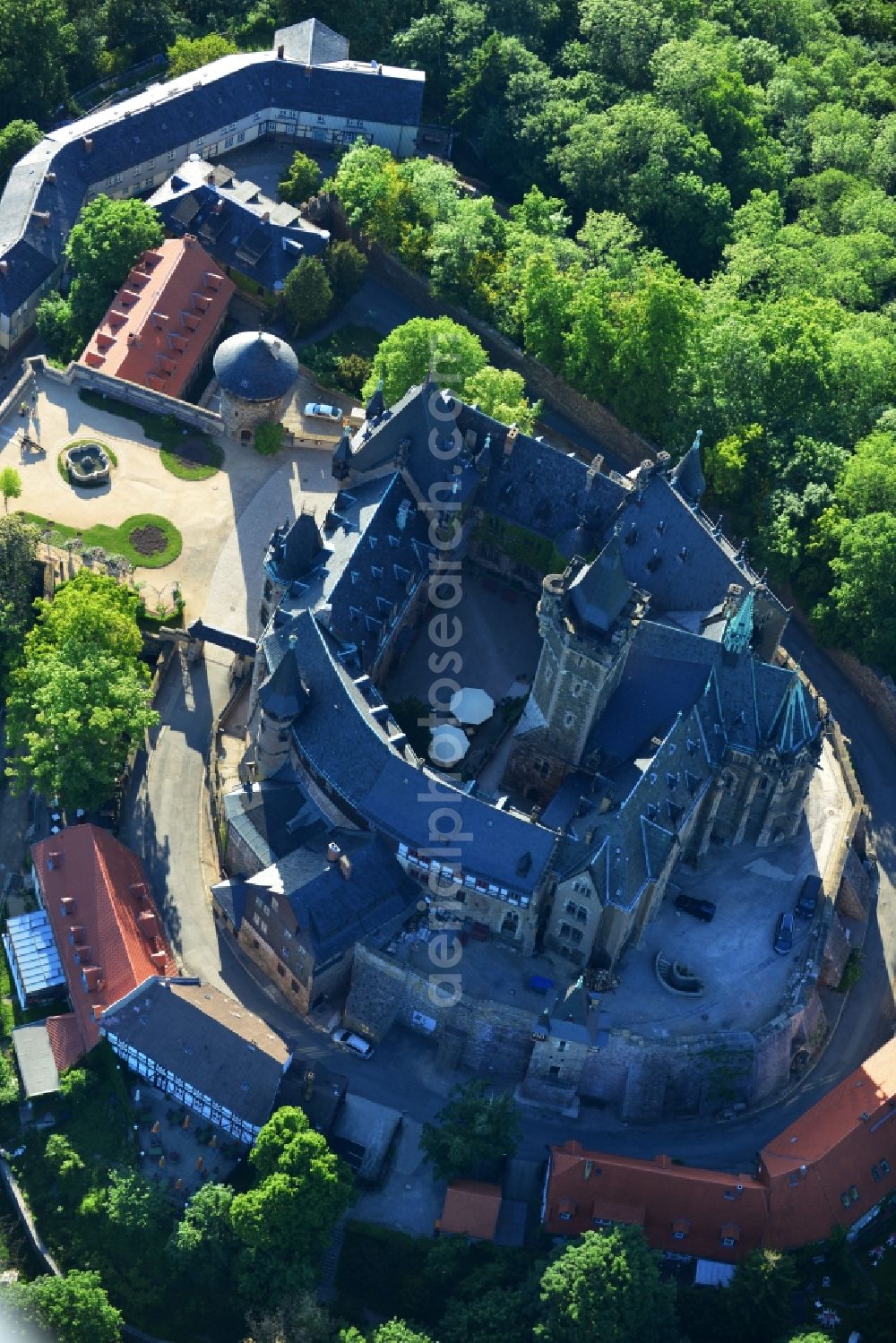 Wernigerode from the bird's eye view: View of the Wernigerode Castle in Wernigerode in the state Saxony-Anhalt. The Wernigerode Castle is located in the Harz mountains. Today it houses a popular museum