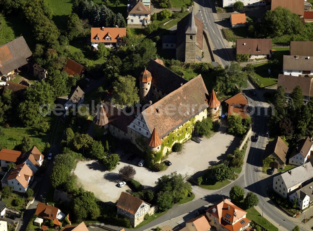 Wiesenthau from above - Wiesenthau Castle in the town of Wiesenthau in the state of Bavaria. The castle is located on the north eastern edge of the district. The renaissance building is a three winged compound with four towers at the corners dated back to the 16th century. It is used as a restaurant, cottage and hotel today