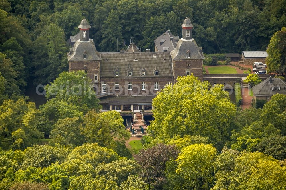 Aerial image Essen - The castle hotel Hugenpoet in Essen in the state North Rhine-Westphalia. The moated castle is located at the Thyssenstrasse