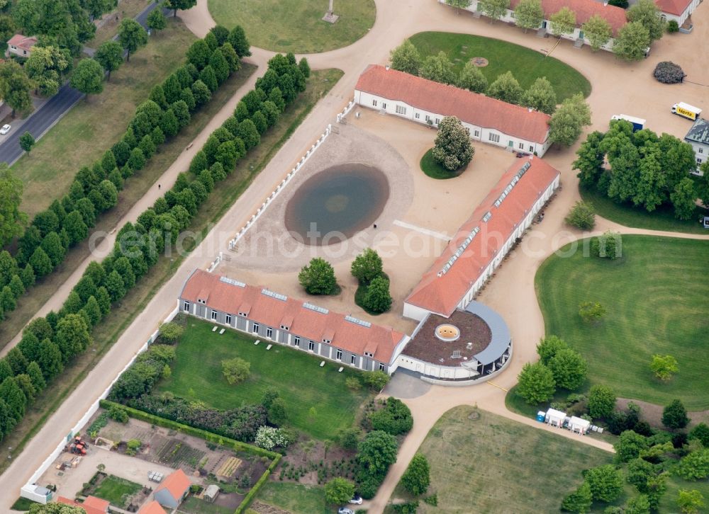 Aerial image Neuhardenberg - Views of the Castle Hotel and the Schinkel Church in Neuhardenberg in the Federal State of Brandenburg. The Stiftung Schloss Hardenberg new GmbH is a wholly owned subsidiary of the German savings banks Association (DSGV) and was founded in 2001, around the DSGV bought and extensively renovated and refurbished Castle as a Center for culture, art, science and business ethics with a five-star hotel and rooms for meetings, to conferences and events