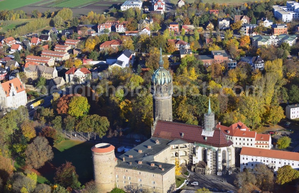 Wittenberg from the bird's eye view: View over the tower on the southern wing of the castle of Wittenberg onto the church. At the church, Martin Luther spread his disputation in 1517 and caused the Reformation. The castle is part of UNESCO's world cultural heritage