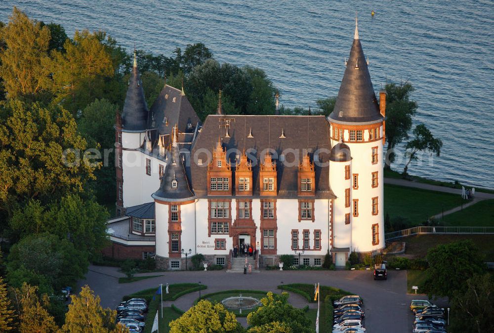 Aerial image Klink / Müritz - Sonnenaufgang am Schloßpark und das Schloßhotel Klink im gleichnamigen Erholungsort am Ufer der Müritz in Mecklenburg-Vorpommern. Castle Park and the Castle Hotel in Klink same resort on the shores of Lake Müritz in Mecklenburg-Vorpommern.