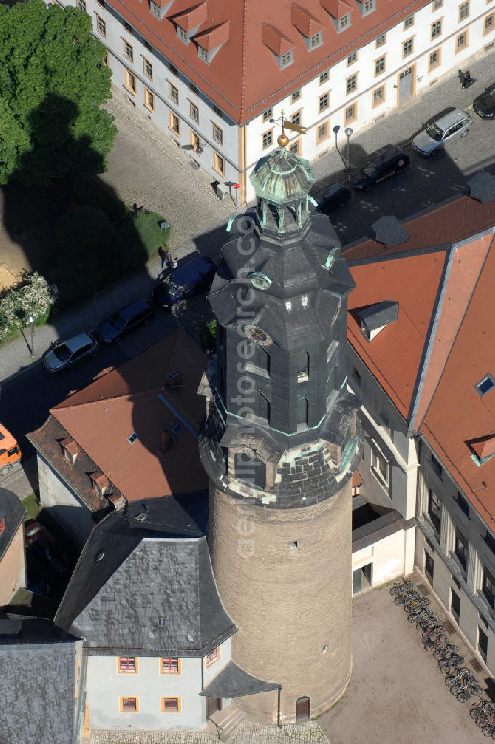 Aerial photograph Weimar - Blick auf den Schlossturm des Weimarer Stadtschlosses (auch Residenzschloss genannt). Das Schloss ist Teil des UNESCO-Weltkulturerbes „ Klassisches Weimar “ und seit Ende 2008 im Eigentum der Klassik Stiftung Weimar, mit Ausnahme des Gebäudeensembles der Bastille, das der Stiftung Thüringer Schlösser und Gärten gehört. View of the Tower of Weimar City Palace . The castle is a UNESCO World Heritage Site Classical Weimar since the end of 2008 and the property of the Weimar Classics Foundation.