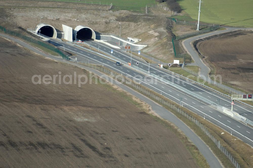 Aerial photograph Oberheldrungen - Blick auf den Schmücketunnel im Bereich der neuen Trassenführung der Autobahn A71 südwestlich von Harras / Oberheldrungen in Thüringen nach der Verkehrsfreigabe. SCHÜßLER PLAN, BARESEL; KUNZ Bau; HERMANN KIRCHNER Bauunternehmung GmbH in Projektdurchführung durch die DEGES Deutsche Einheit Fernstraßenplanungs- und -bau GmbH.View of the Schmücketunnel in the new route of the A71 motorway southwest of Harass / Oberheldrungen in Thuringia after the opening to traffic.