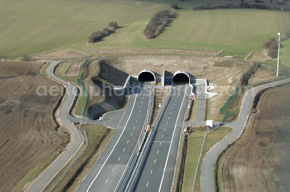 Oberheldrungen from above - Blick auf den Schmücketunnel im Bereich der neuen Trassenführung der Autobahn A71 südwestlich von Harras / Oberheldrungen in Thüringen nach der Verkehrsfreigabe. SCHÜßLER PLAN, BARESEL; KUNZ Bau; HERMANN KIRCHNER Bauunternehmung GmbH in Projektdurchführung durch die DEGES Deutsche Einheit Fernstraßenplanungs- und -bau GmbH.View of the Schmücketunnel in the new route of the A71 motorway southwest of Harass / Oberheldrungen in Thuringia after the opening to traffic.