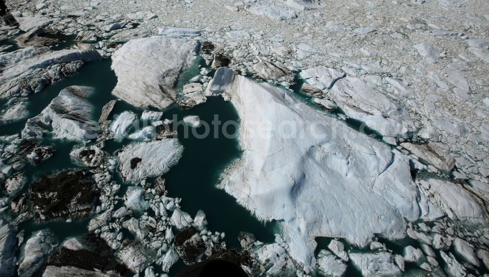 Kenai Fjords National Park from the bird's eye view: Melting glaciers remnants of Aialik Glacier floating in glacier lake in Kenai Fjords National Park on the Kenai Peninsula in Alaska in the United States of America USA