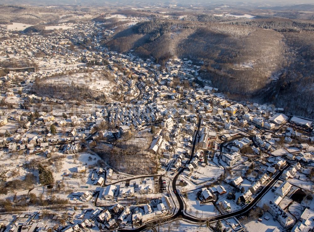 Freudenberg from the bird's eye view: Snow-covered historic town centre Alter Flecken of Freudenberg with half-timbered buildings in the state of North Rhine-Westphalia