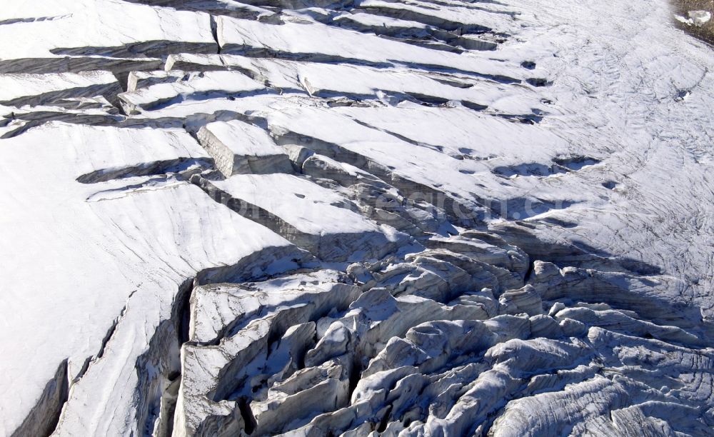 Aerial image Ormont-Dessus - Snow-covered hilltop of Les Diablerets in Ormont-Dessus in Switzerland