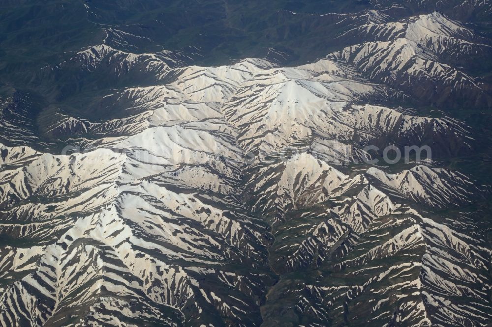 Aerial image Piranschahr - Snowy desert landscape in the mountains of West Azerbaijan Province, Iran