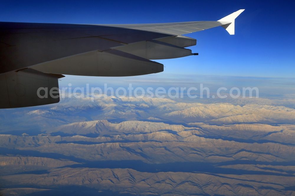 Erbil Governorate from the bird's eye view: Snowcovered mountain landscape of the Zagros Mountains in Kurdistan in the border area of Iraq and Iran in Erbil Governorate in Iraq