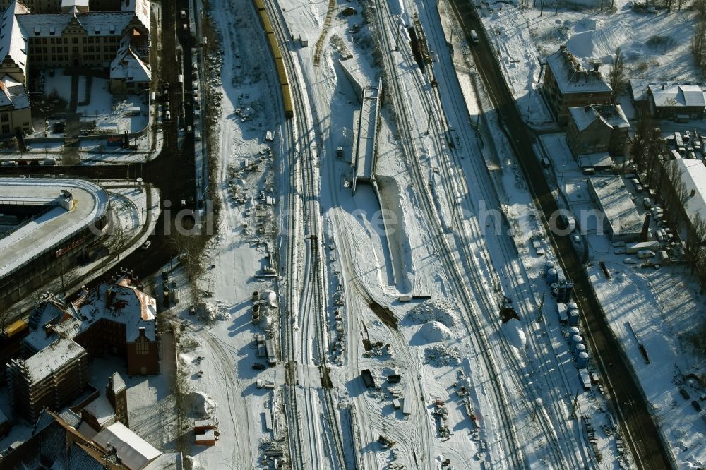 Aerial image Berlin - Snow-covered railway tracks and construction site East of the train station Berlin Ostkreuz in Berlin in Germany