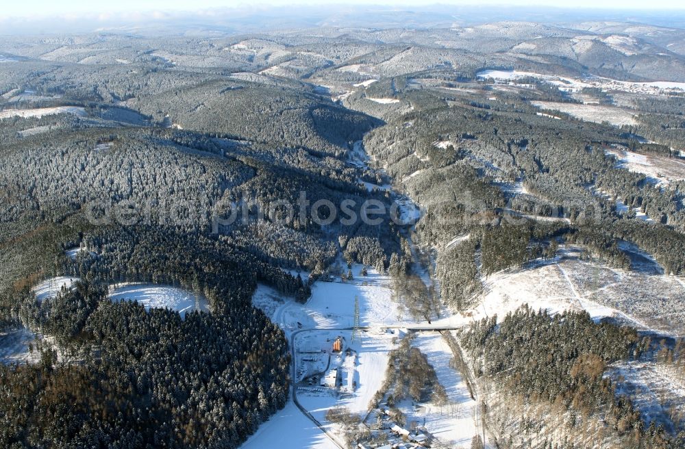 Langewiesen from the bird's eye view: Snow-covered hills of the landscape in Langewiesen in the state of Thuringia