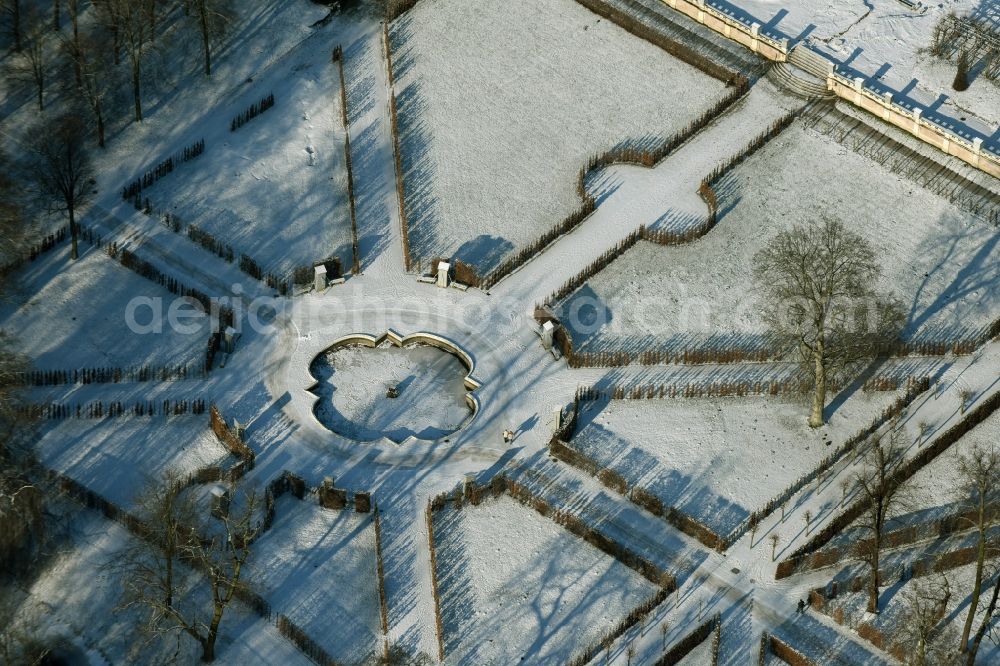 Aerial photograph Potsdam - Snow covered park at the main path Hauptallee in the Sanssouci Park in Potsdam in the state of Brandenburg