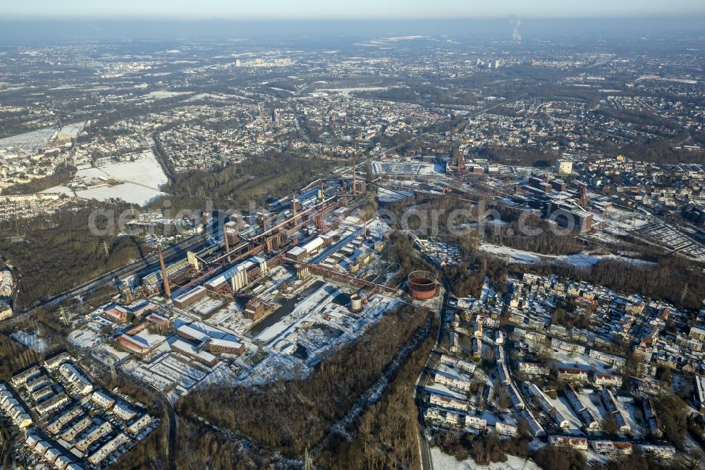 Essen from the bird's eye view: Snow-covered winter landscape from the site of the Zeche Zollverein coking plant in Essen in North Rhine-Westphalia