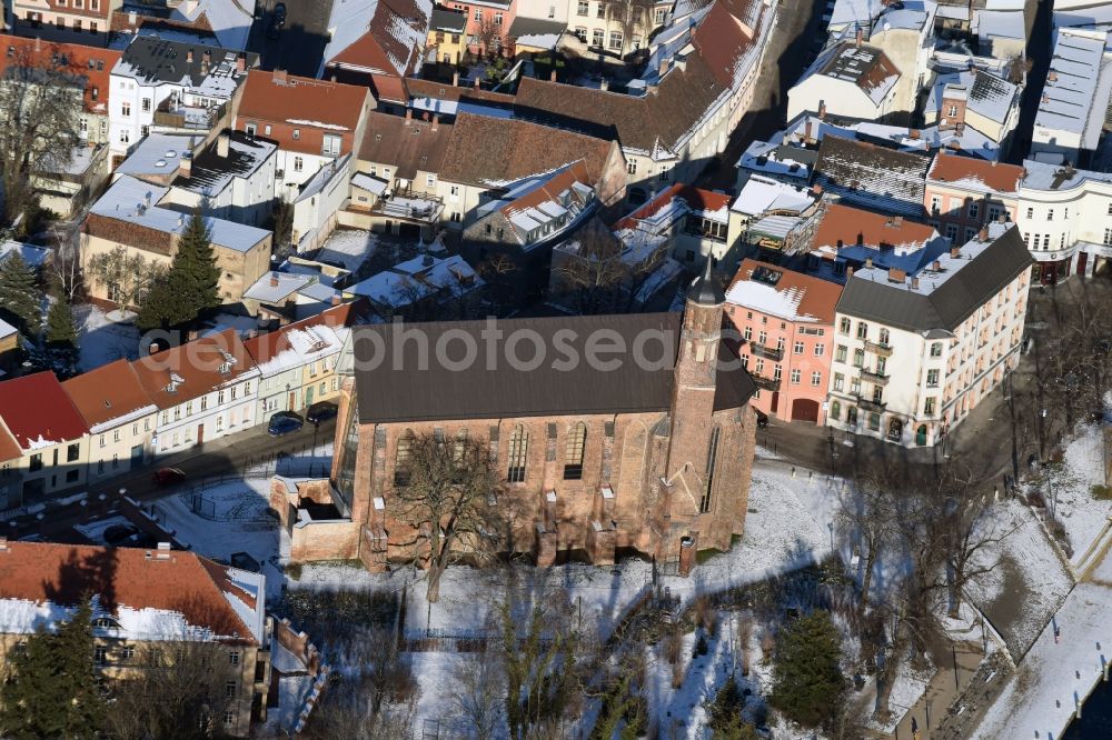 Brandenburg an der Havel from above - Wintry snowy church building of the former monastery church of Saint Johannis in Brandenburg an der Havel in the state of Brandenburg. The church is used for events