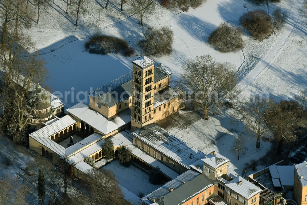 Potsdam from the bird's eye view: Wintry snowy church building of the Peace Church on Maryl Gardens in the Sanssouci Park in Potsdam in the state of Brandenburg