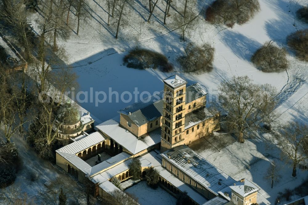 Aerial image Potsdam - Wintry snowy church building of the Peace Church on Maryl Gardens in the Sanssouci Park in Potsdam in the state of Brandenburg