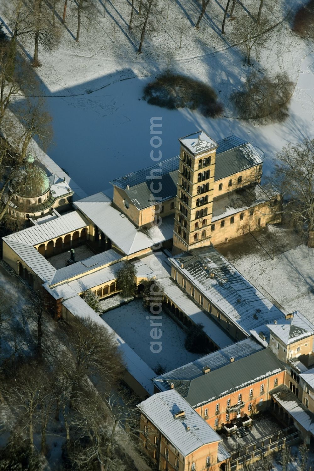 Aerial photograph Potsdam - Wintry snowy church building of the Peace Church on Maryl Gardens in the Sanssouci Park in Potsdam in the state of Brandenburg