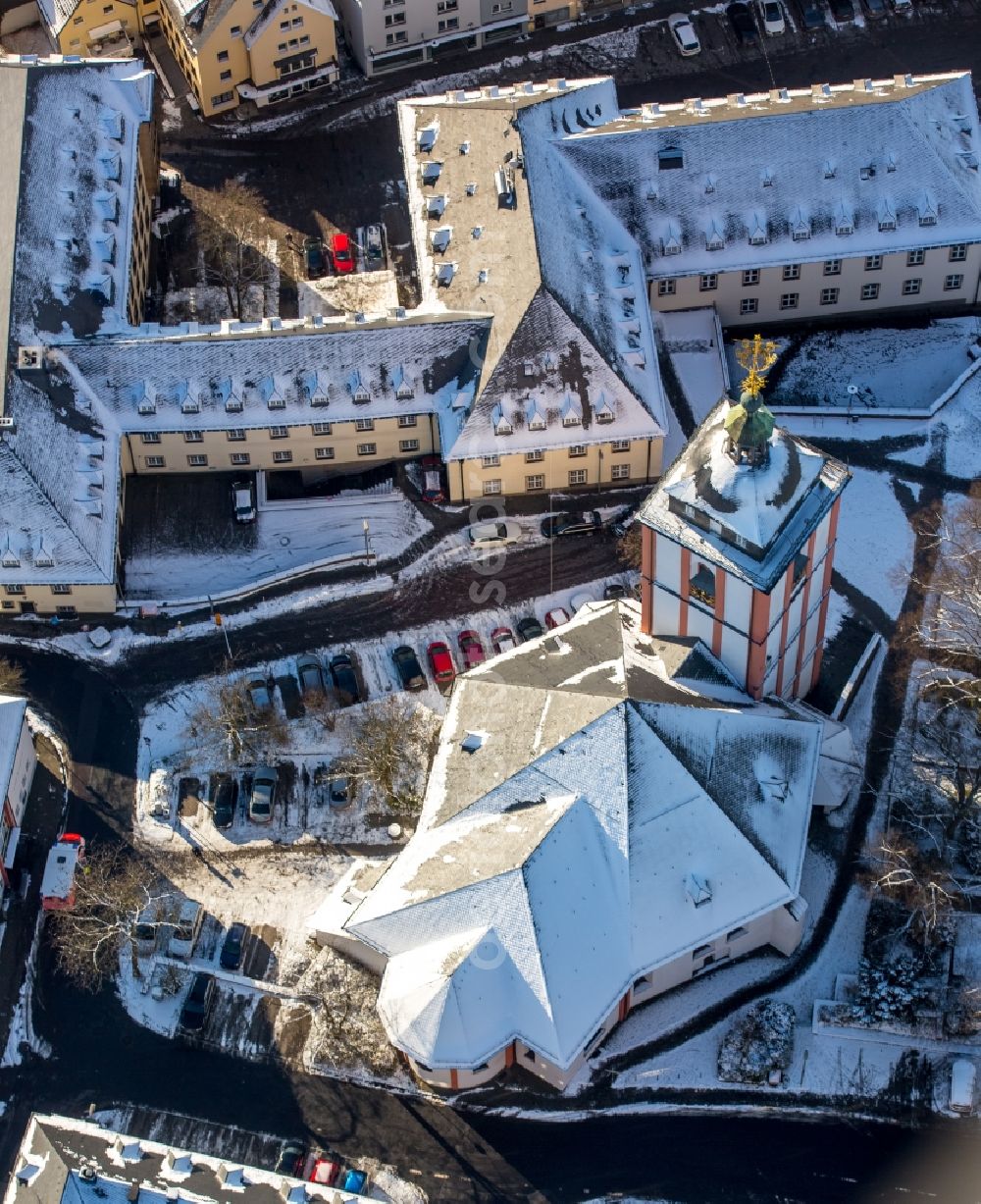 Aerial image Siegen - Wintry snowy church building Nikolaikirche in Siegen in the state North Rhine-Westphalia