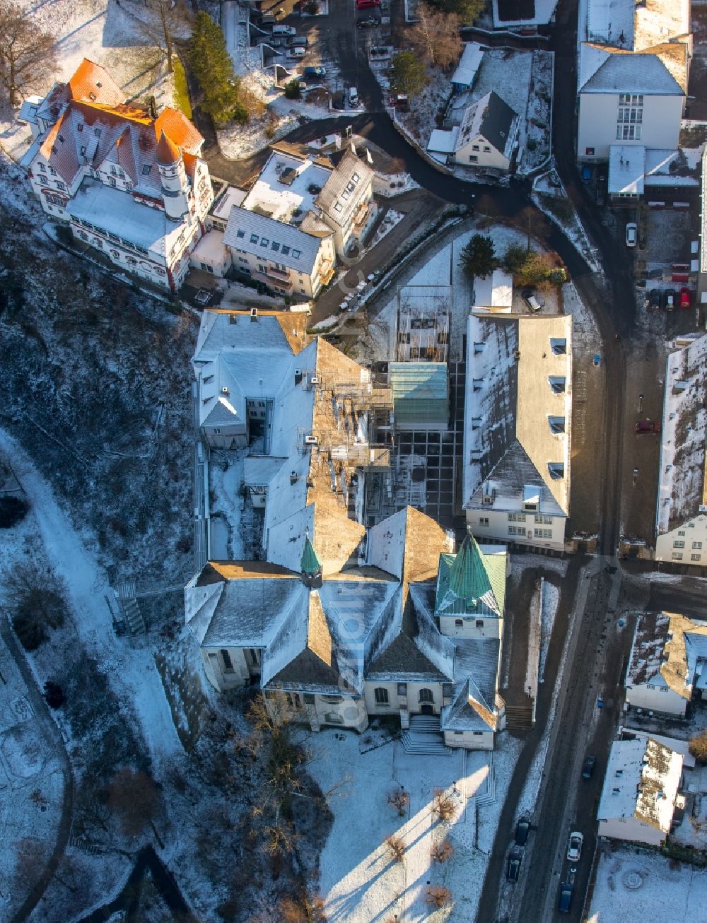 Arnsberg from above - Snow covered Church building of the church Saint Laurentius of the former monastery Wedinghausen in Arnsberg in the state of North Rhine-Westphalia