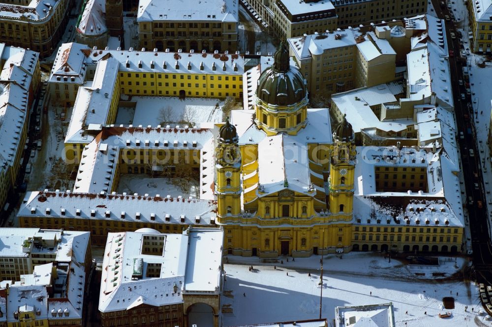 München from above - Wintry snowy church building in the Theatinerkirche also Catholic Collegiate Church of St. Cajetan called in Munich in Bavaria