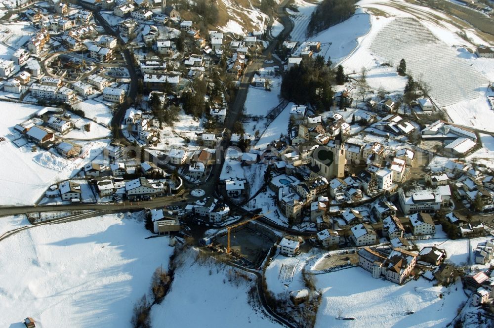 Aerial photograph Völs am Schlern - Fié allo Sciliar - Wintry snowy church building in Voels am Schlern - Fie allo Sciliar in Trentino-Alto Adige, Italy