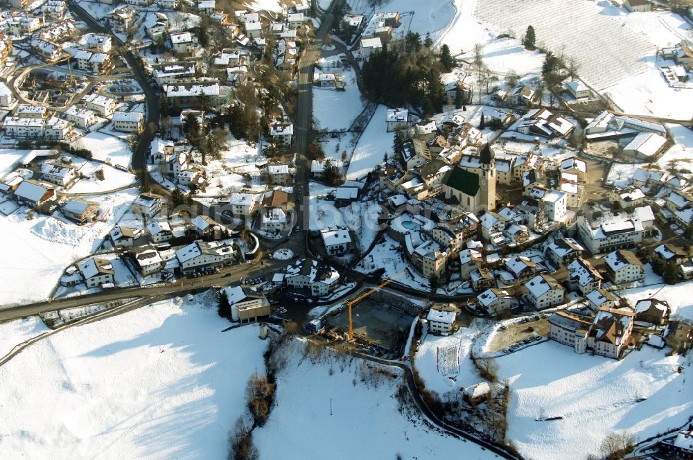 Völs am Schlern - Fié allo Sciliar from above - Wintry snowy church building in Voels am Schlern - Fie allo Sciliar in Trentino-Alto Adige, Italy