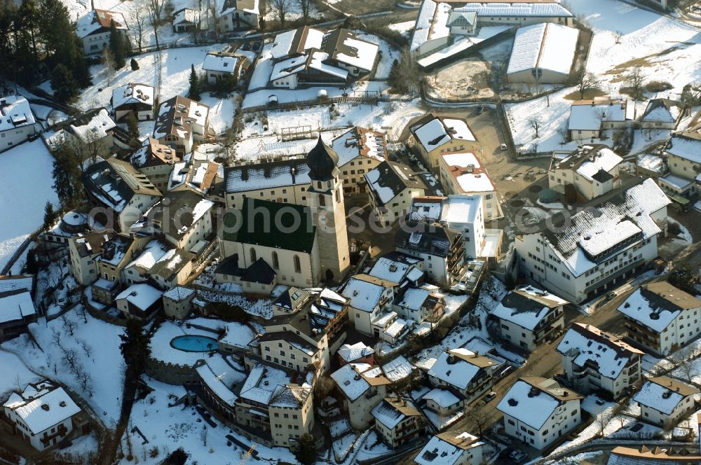 Aerial photograph Völs am Schlern - Fié allo Sciliar - Wintry snowy church building in Voels am Schlern - Fie allo Sciliar in Trentino-Alto Adige, Italy