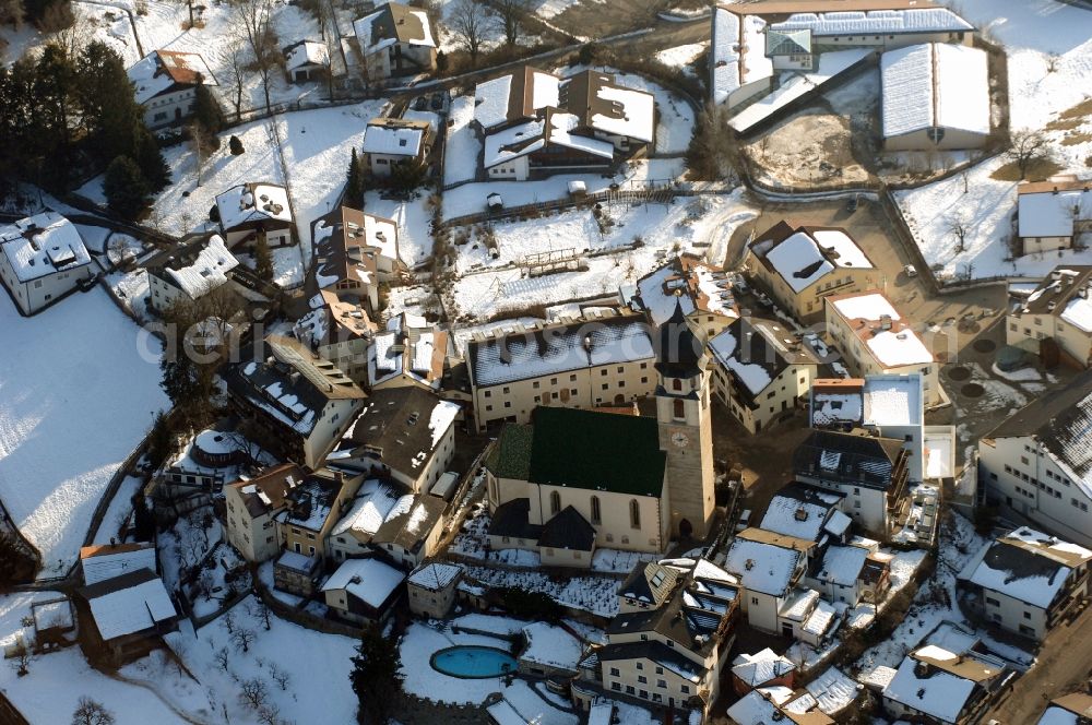 Aerial image Völs am Schlern - Fié allo Sciliar - Wintry snowy church building in Voels am Schlern - Fie allo Sciliar in Trentino-Alto Adige, Italy