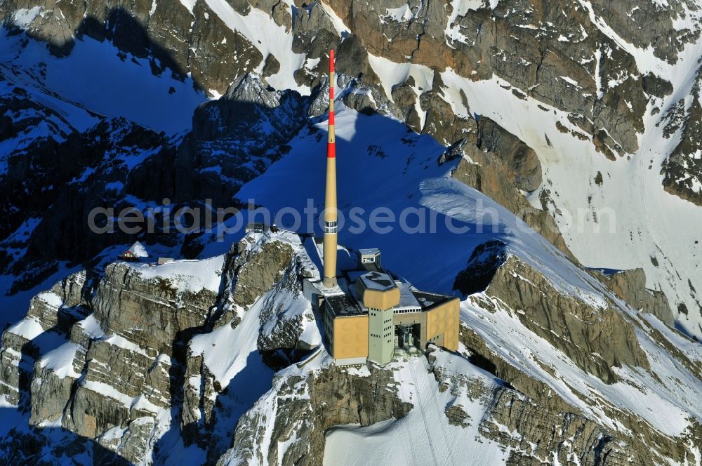 Säntis from above - Snow veiled mountain range Santis - Mountain in the Appenzell Alps in Switzerland