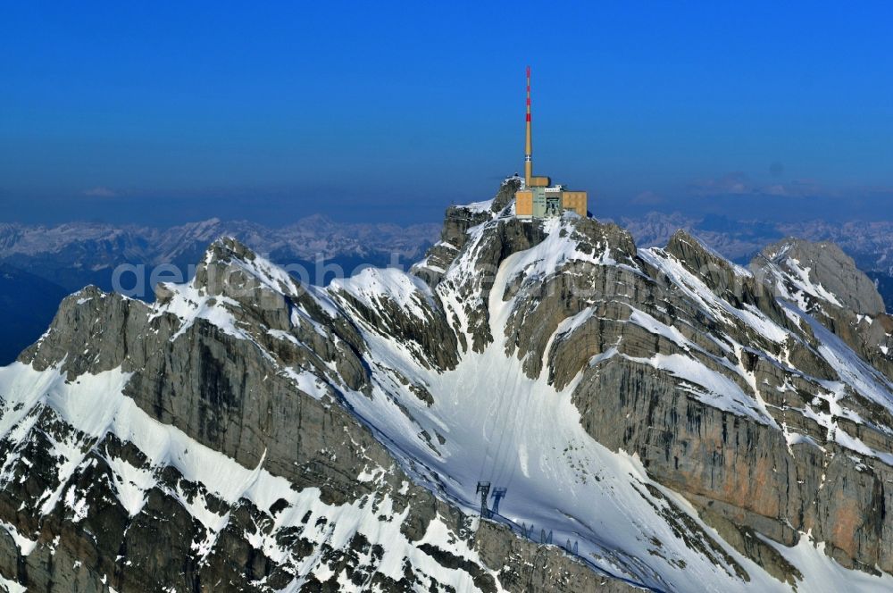 Säntis from above - Snow veiled mountain range Santis - Mountain in the Appenzell Alps in Switzerland