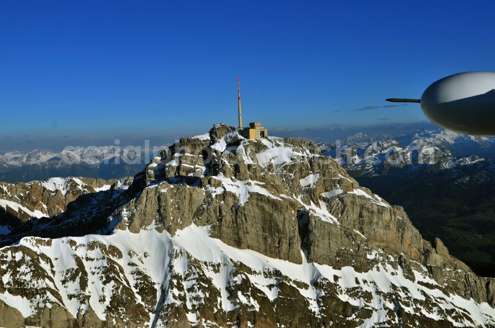 Säntis from above - Snow veiled mountain range Santis - Mountain in the Appenzell Alps in Switzerland