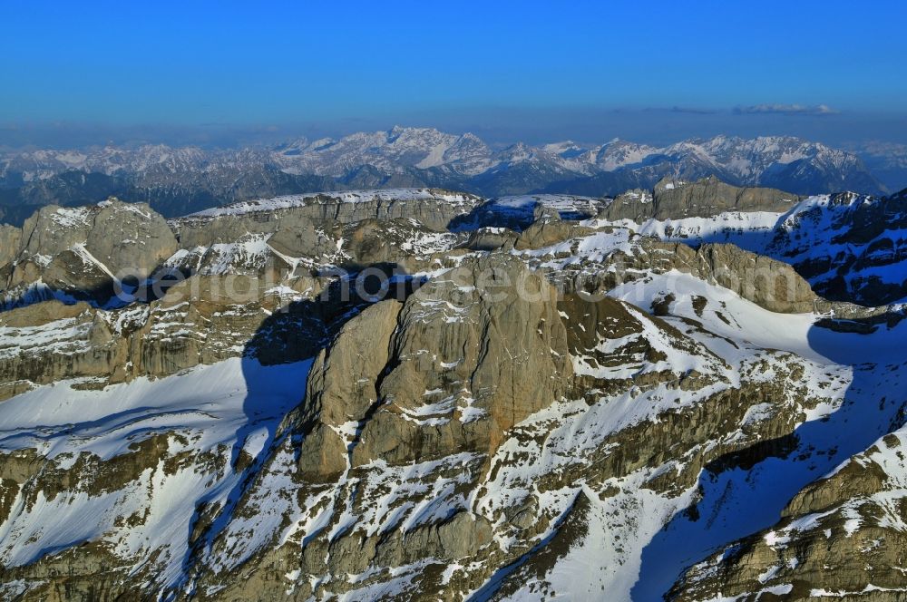 Säntis from above - Snow veiled mountain range Santis - Mountain in the Appenzell Alps in Switzerland