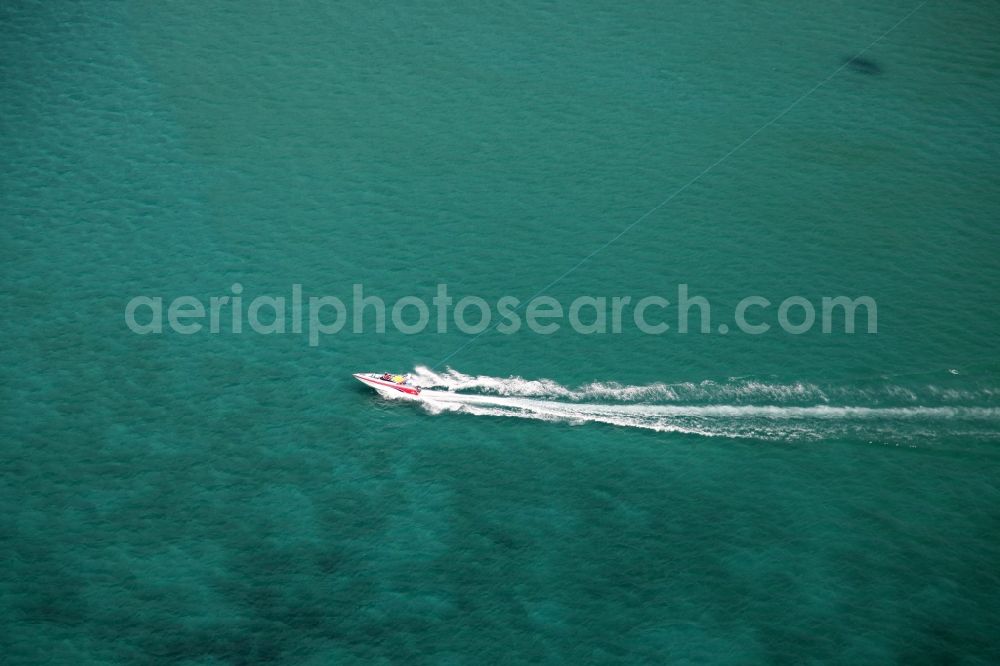 Aerial photograph Kammala - Speedboat in the Andaman Sea in front of the city Kammala on the island of Phuket in Thailand