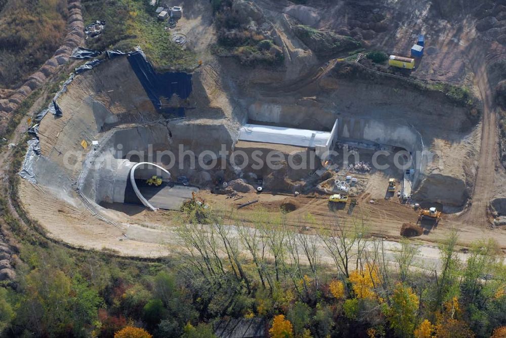 Aerial photograph Meißen - Blick auf die Bauarbeiten am 719 m langen Schottenbergtunnel durch die Ed. Züblin AG, Albstadtweg 3, 70567 Stuttgart - Tel.: 711 7883-0 - Telefax: 711 7883-390 - E-Mail info@zueblin.de zur Umfahrung der Stadt Meißen. Damit soll das steigende Verkehrsaufkommen entlastet werden sowie die Anwohner und die Albrechtsburg.