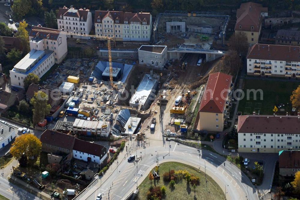 Aerial photograph Meißen - Blick auf die Bauarbeiten am 719 m langen Schottenbergtunnel durch die Ed. Züblin AG, Albstadtweg 3, 70567 Stuttgart - Tel.: 711 7883-0 - Telefax: 711 7883-390 - E-Mail info@zueblin.de zur Umfahrung der Stadt Meißen an der Leipziger Straße.