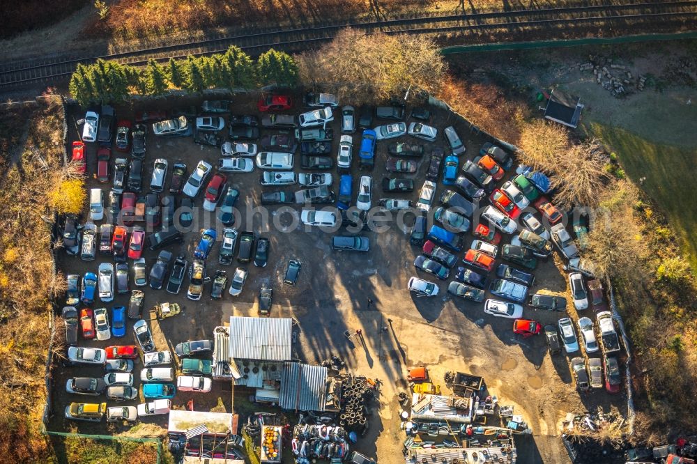 Lüdenscheid from the bird's eye view: Scrapyard for recycling of cars cars and used vehicles with decomposition and aftermarket of AVL - Autoverwertung Luedenscheid GmbH on Dammstrasse in Luedenscheid in the state North Rhine-Westphalia, Germany