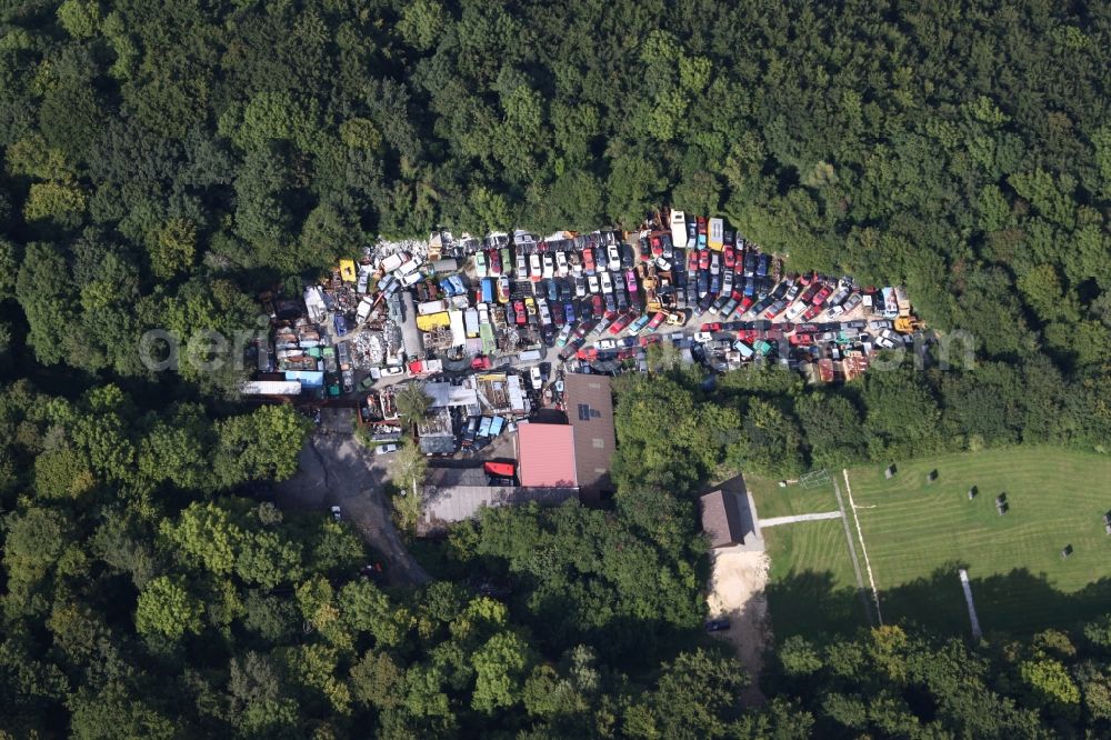 Deggingen from above - In the middle of a forest near Deggingen, in the state Baden-Wuerttemberg, the junkyard of the car recycling company Autoverwertung Fischer is located