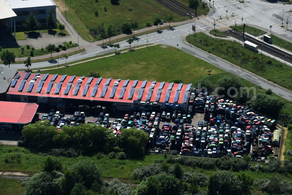 Schwerin from above - Scrapyard for recycling of cars cars and used vehicles with decomposition and aftermarket der Hoffmann & Berger OHG on Carl-von-Linde-Strasse in Schwerin in the state Mecklenburg - Western Pomerania