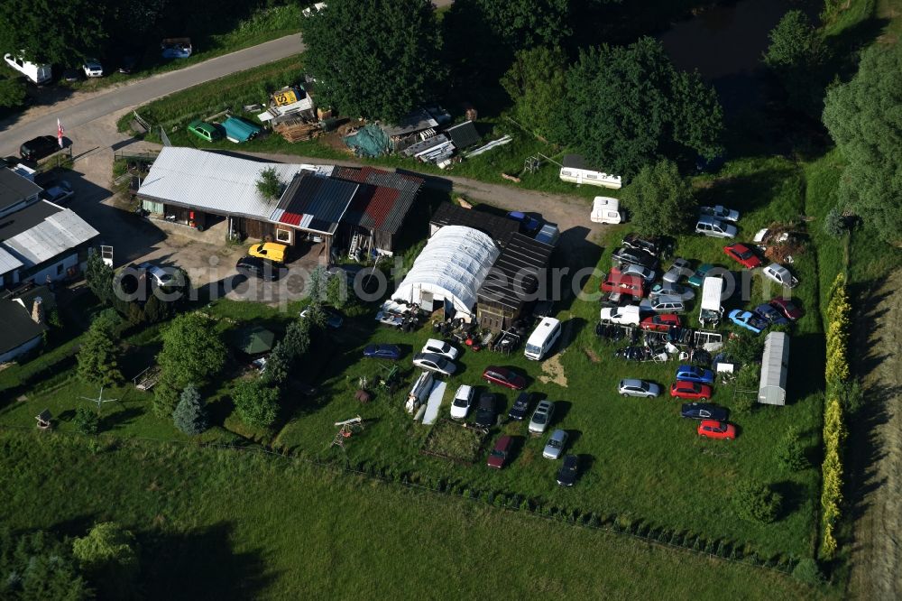 Aerial photograph Karenz - Scrapyard for recycling of cars cars and used vehicles with decomposition and aftermarket in Karenz in the state Mecklenburg - Western Pomerania