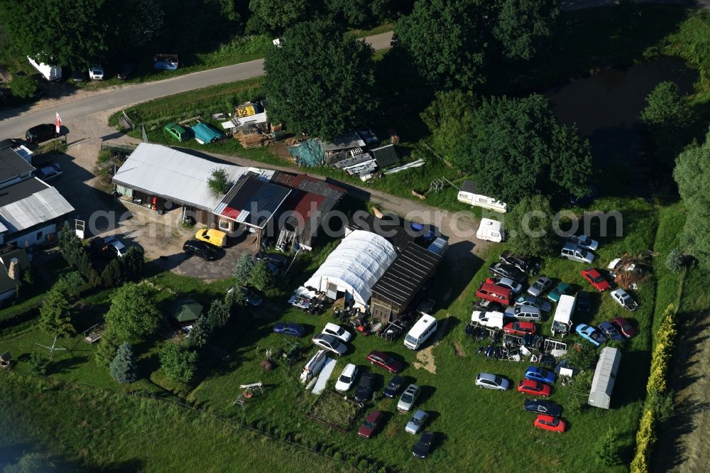 Karenz from the bird's eye view: Scrapyard for recycling of cars cars and used vehicles with decomposition and aftermarket in Karenz in the state Mecklenburg - Western Pomerania