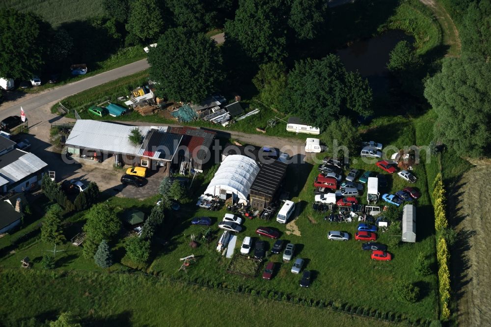 Aerial image Karenz - Scrapyard for recycling of cars cars and used vehicles with decomposition and aftermarket in Karenz in the state Mecklenburg - Western Pomerania