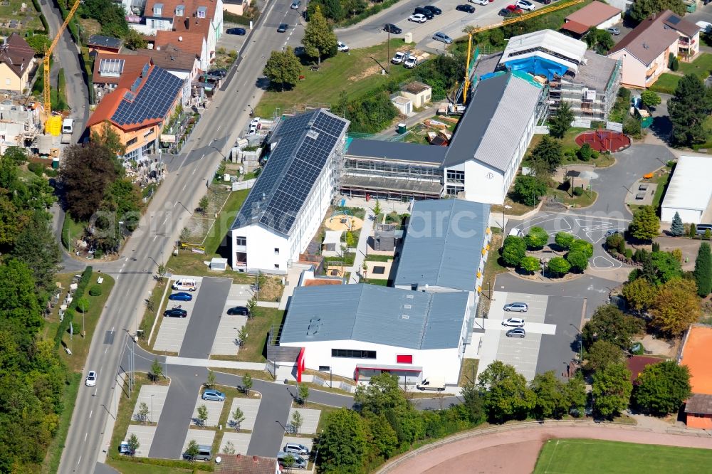 Krautheim from above - School building of the Andreas-Froehlich-Schule at the Goetzstrasse and the Bildungszentrum Hohenlohe-Franken Grund- und Werkrealschule Krautheim at Gustav-Meyer-Zentrum in Krautheim in the state Baden-Wurttemberg, Germany