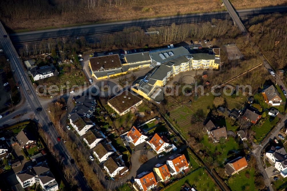 Aerial image Witten - School building of the school Blote-Vogel-Schule and the nearby motorway A44 aswell as the road Stockumer Strasse with surrounding residential houses and fields in Witten in the state North Rhine-Westphalia