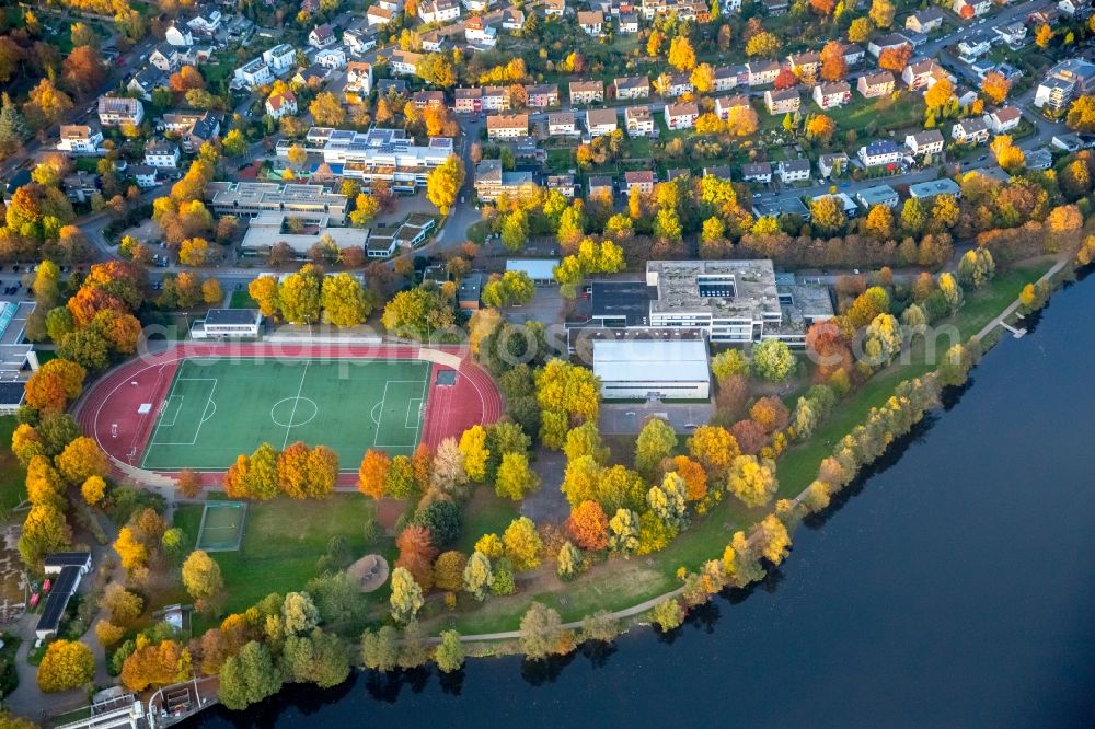 Herdecke from the bird's eye view: School building of the Friedrich Harkort Schule in Herdecke with a view of the Ruhr and the sports complex of the TSG Fussball Herdecke 1911 e.V. in the state North Rhine-Westphalia