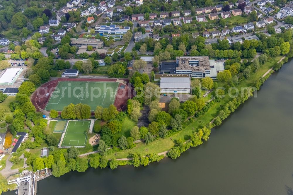 Aerial photograph Herdecke - School building of the Friedrich Harkort Schule in Herdecke with a view of the Ruhr and the sports complex of the TSG Fussball Herdecke 1911 e.V. in the state North Rhine-Westphalia