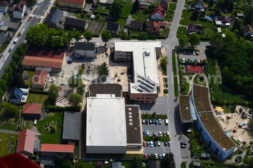 Bernau from above - School building of the Grundschule Schoenow on Dorfstrasse in the district Schoenow in Bernau in the state Brandenburg, Germany