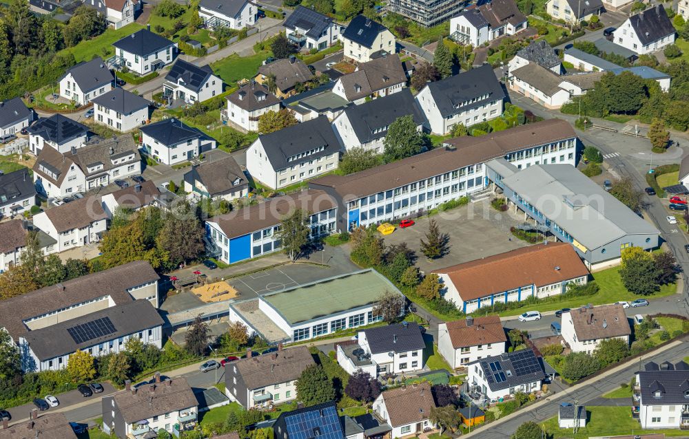 Aerial image Grevenbrück - School building of the Janusz-Korczak-Schule and St. Nikolaus-Schule on street Hangstrasse in Grevenbrueck in the state North Rhine-Westphalia, Germany