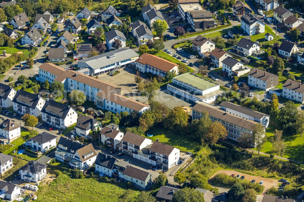 Grevenbrück from above - School building of the Janusz-Korczak-Schule and St. Nikolaus-Schule on street Hangstrasse in Grevenbrueck in the state North Rhine-Westphalia, Germany